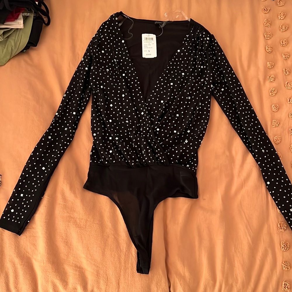 Brand new diamond studded body suit. Mesh back